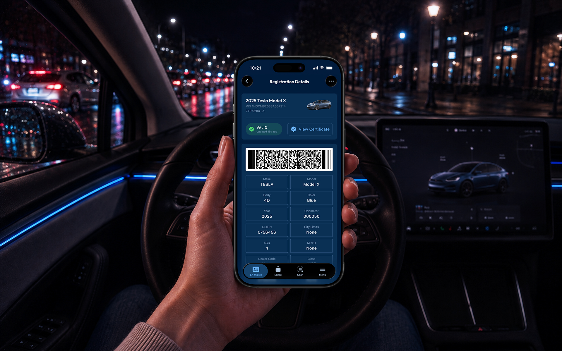 LA Wallet vehicle registration for a Tesla Model X, on a phone inside a car at night